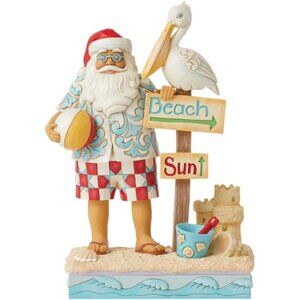 Jim Shore Heartwood Creek Coastal Santa with Beach Signs and Pelican Figurine